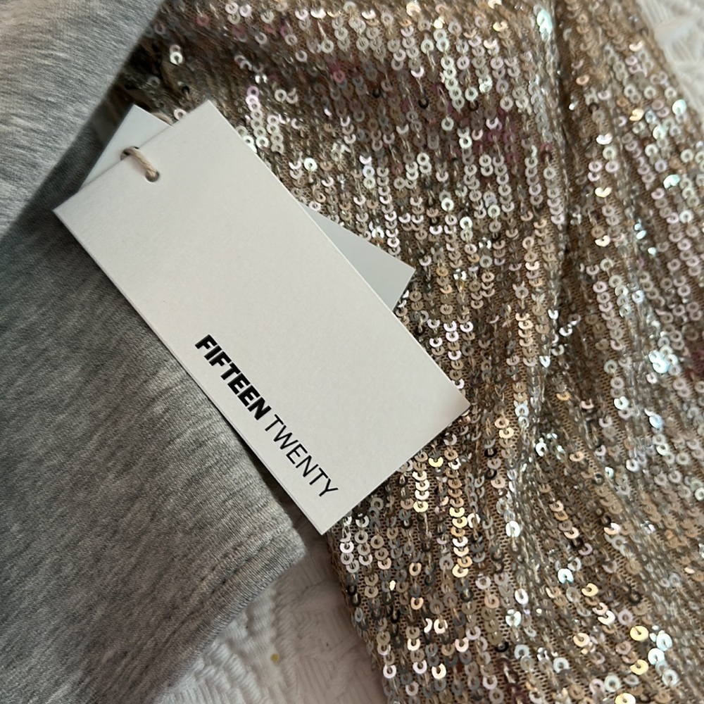 Sweatshirt and Sequins never worn. Luxe